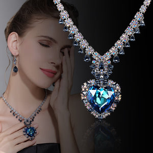 This Montgomery Acquisition is truly a magical  Bliss Pendant Stud Earrings  Necklace Set